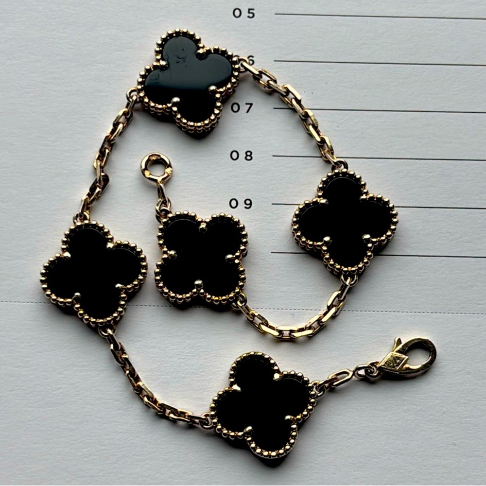 Van Cleef & Arpels onyx and gold 5 motif Alhambra bracelet